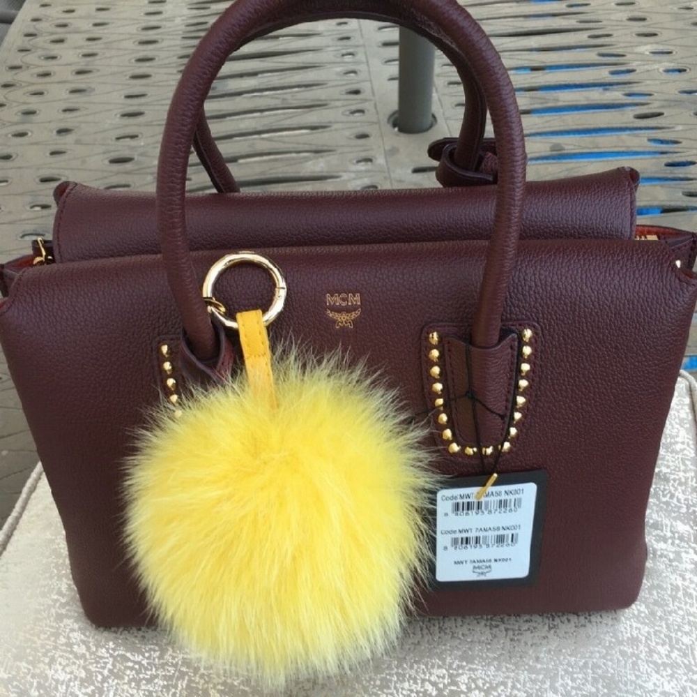 MCM Milla Tote outlined in gold studs